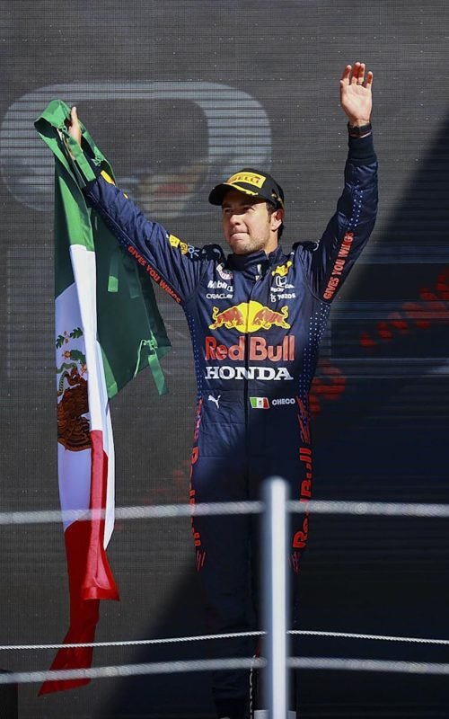 MEXICO CITY, MEXICO - NOVEMBER 07: (BILD OUT) Sergio Perez (MEX), Red Bull Racing Honda on the podium after the F1 Grand Prix of Mexico at Autodromo Hermanos Rodriguez on November 7, 2021 in Mexico City, Mexico. (Photo by Hasan Bratic/DeFodi Images via Getty Images)